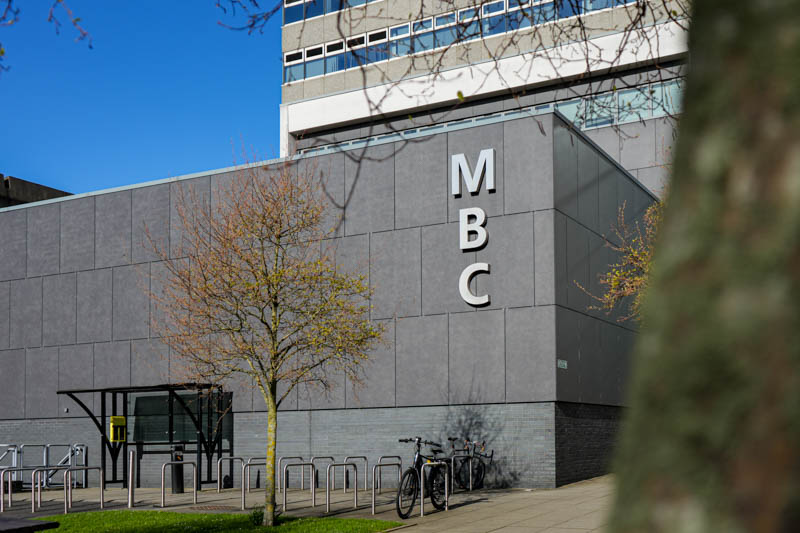 An exterior shot of Queen's University MBC building located at 97 Lisburn Road, Belfast